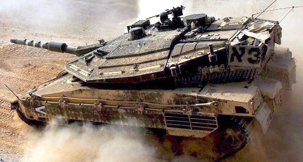 epa00994175 A handout picture released by the Israeli Defence Forces (IDF) shows tanks maneuvering during a large military exercise at an undisclosed location in the Judean Desert, Israel, 27 April 2007. Israel has been carrying out a large armoured exercise for several days in what some Israeli papers say is in preparation for a Syrian attack on the Golan Heights, and included using Israel's most advance tank, the Merkava Mark 4. EPA/ISRAELI DEFENCE FORCES - HANDOUT